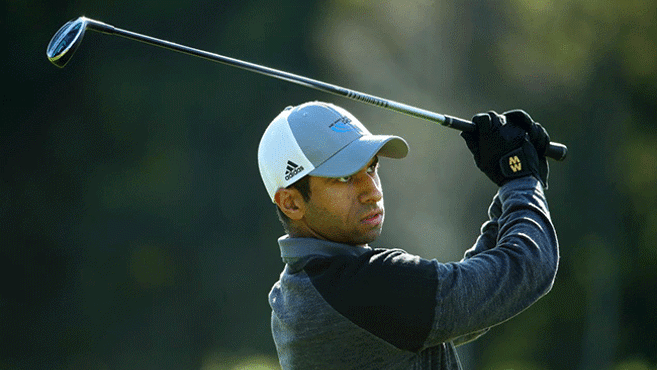 Aaron Rai holds in Storm Alex wearing Macwets during Scottish Open win